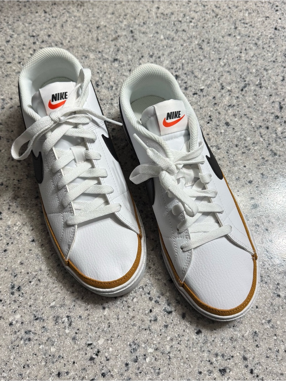 Nike Men’s Legacy Black and Gold Sneakers